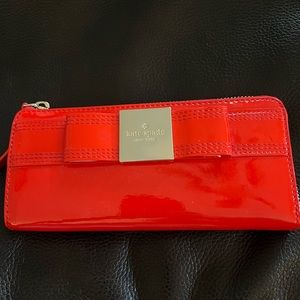 Kate Spade zip around wallet with bow tie detail!
